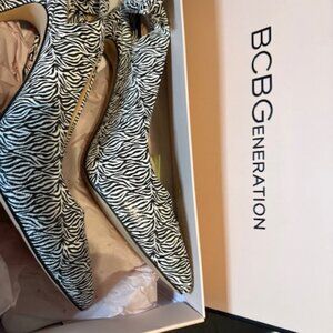 BCBGeneration heels feature a striking black-and-white zebra print